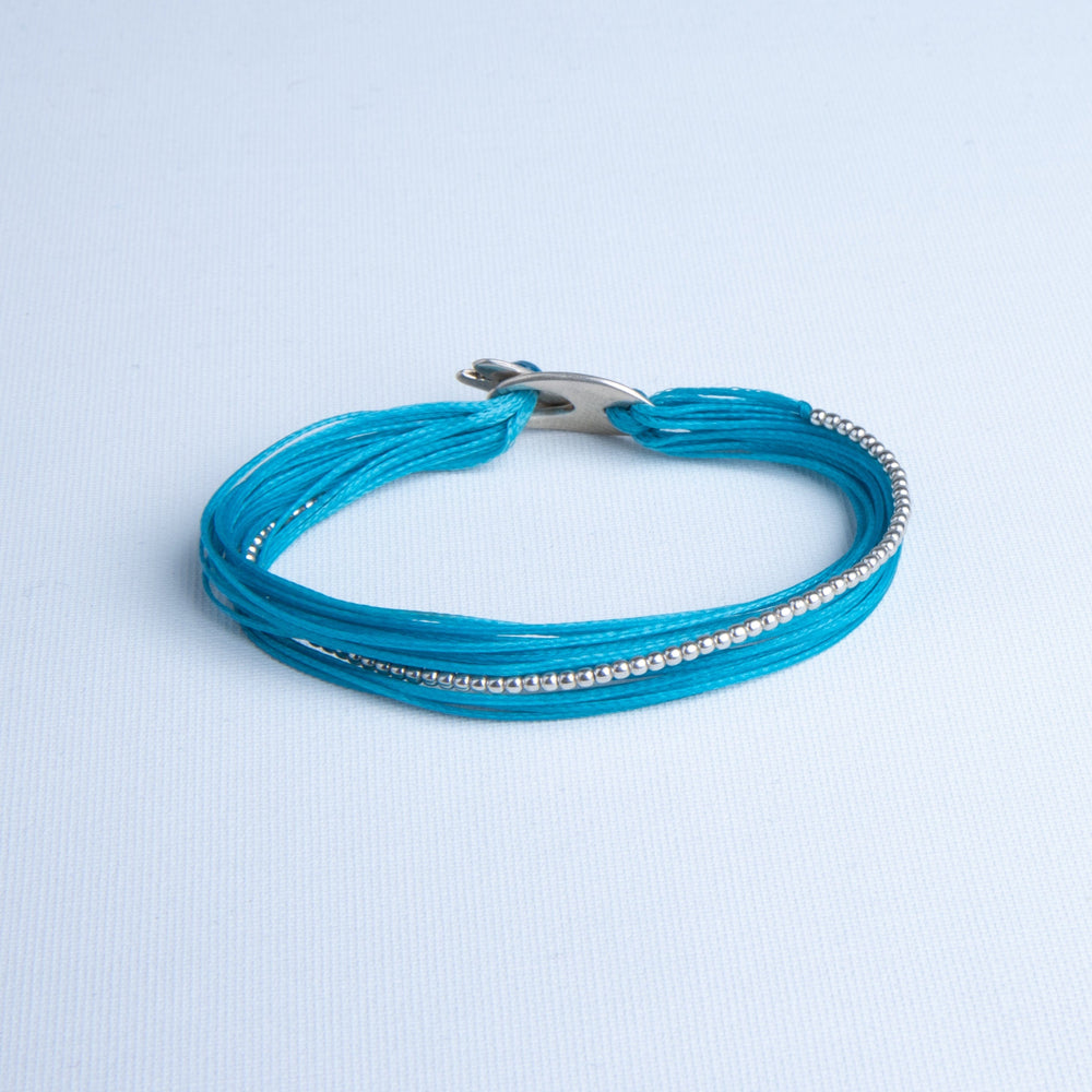 Bracelet with Serie of Silver Beads in Turquoise