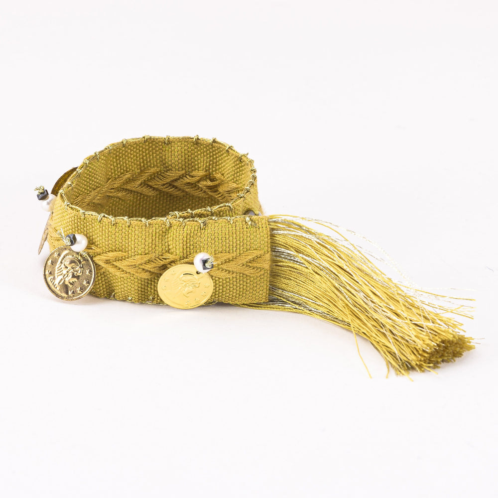 
                
                    Load image into Gallery viewer, Emilia Bracelet with Yellow Tassel
                
            