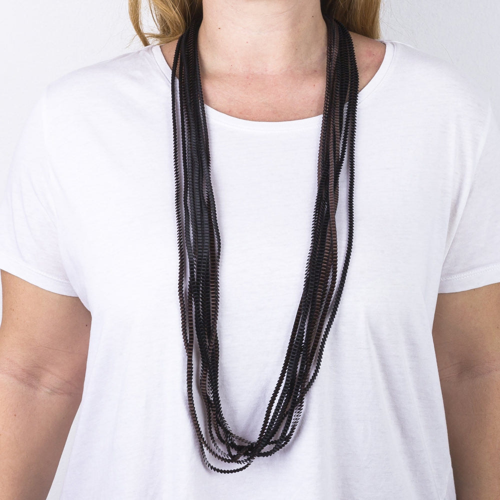 
                
                    Load image into Gallery viewer, Necklace Pleated Lines in Black &amp;amp; Brown
                
            