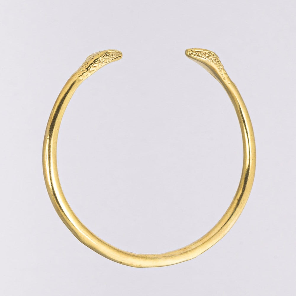 
                
                    Load image into Gallery viewer, Snake Bangle in Gold Plated Brass
                
            